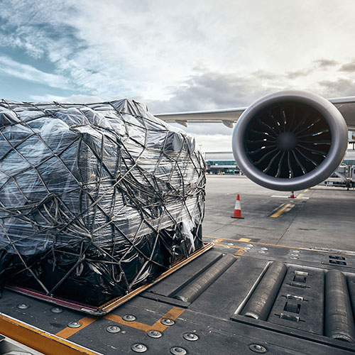 Express Air Freight - consolidated freight ready to be loaded on aeroplane